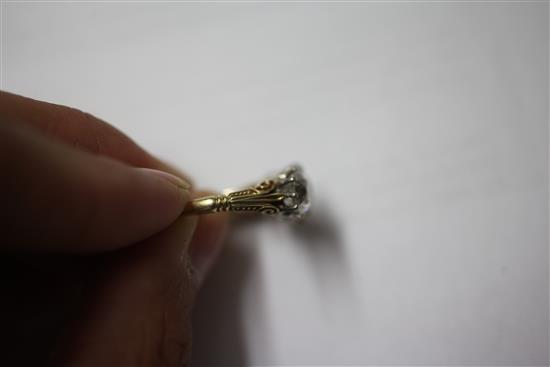 A Victorian style gold three stone diamond ring, size O.